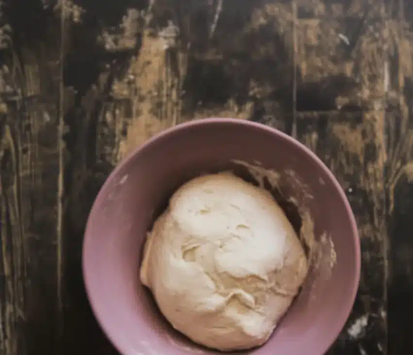 Pizza dough made with cottage cheese in mixing bowl